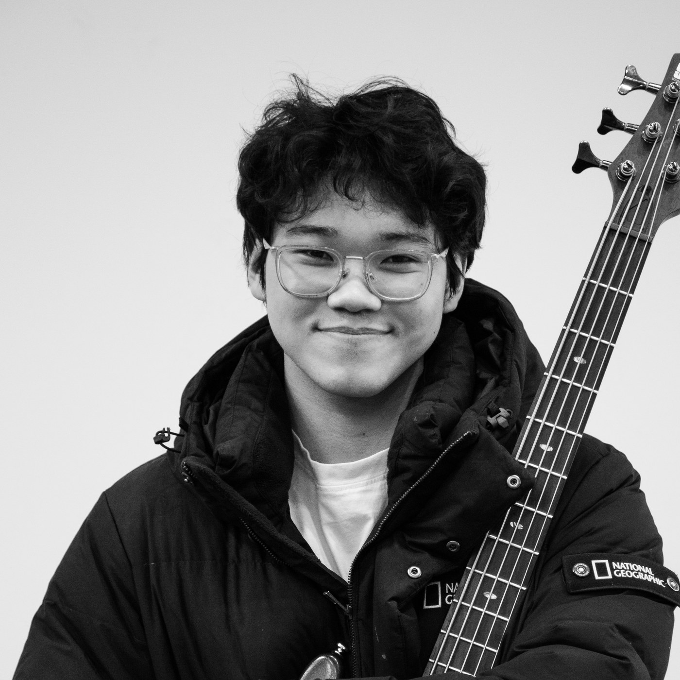 Bo Kang holding his bass